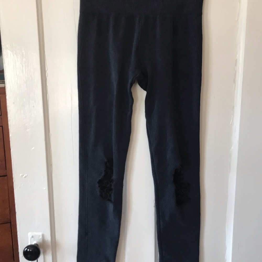 Leggings with “ripped” knee detail